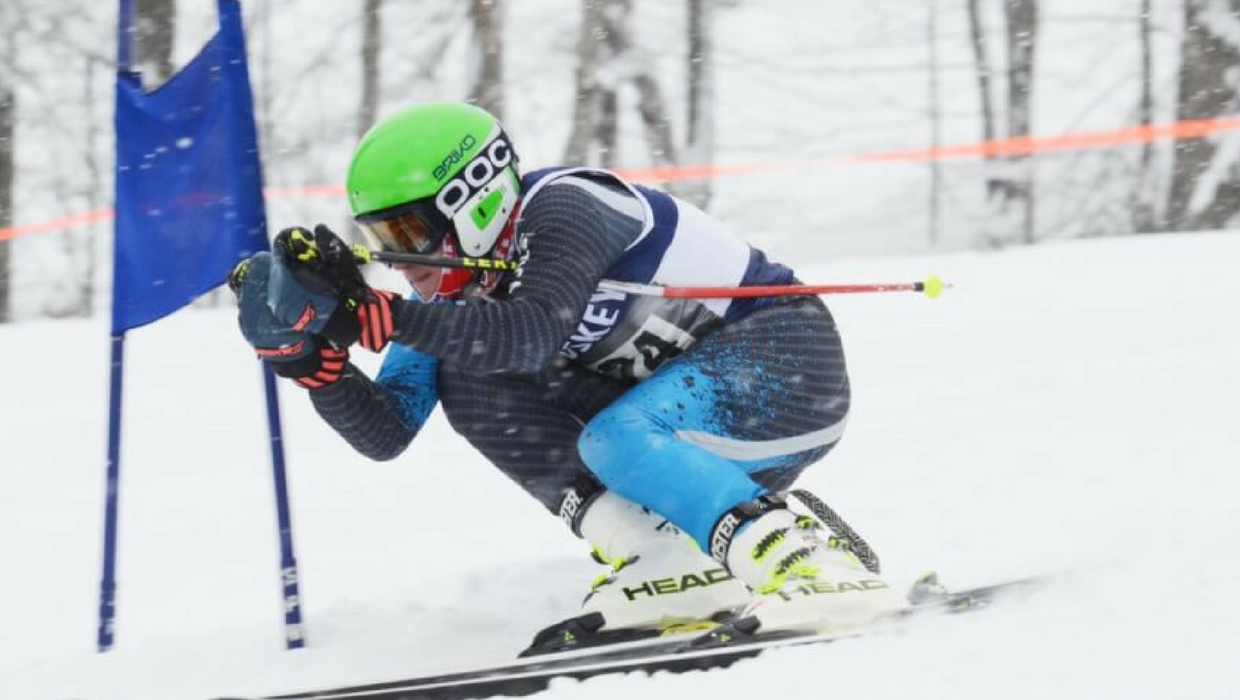 High school ski racer Ethan Seigwart on the ski race course.