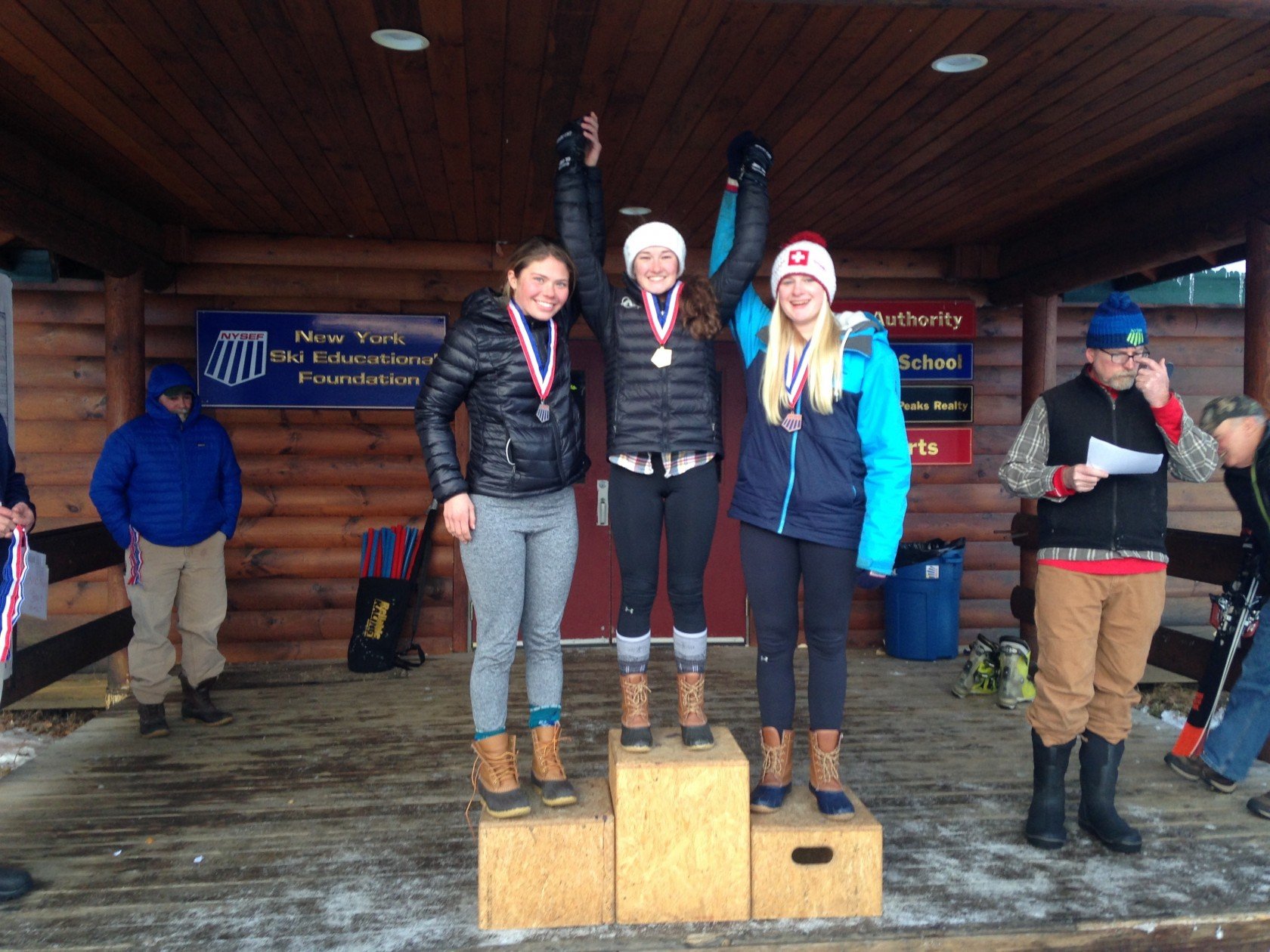 Ski racer Sarah Coombs on top of the podium at her first slalom race of the year at Gore Mountain. As a U16 she was first in SL and Overall.