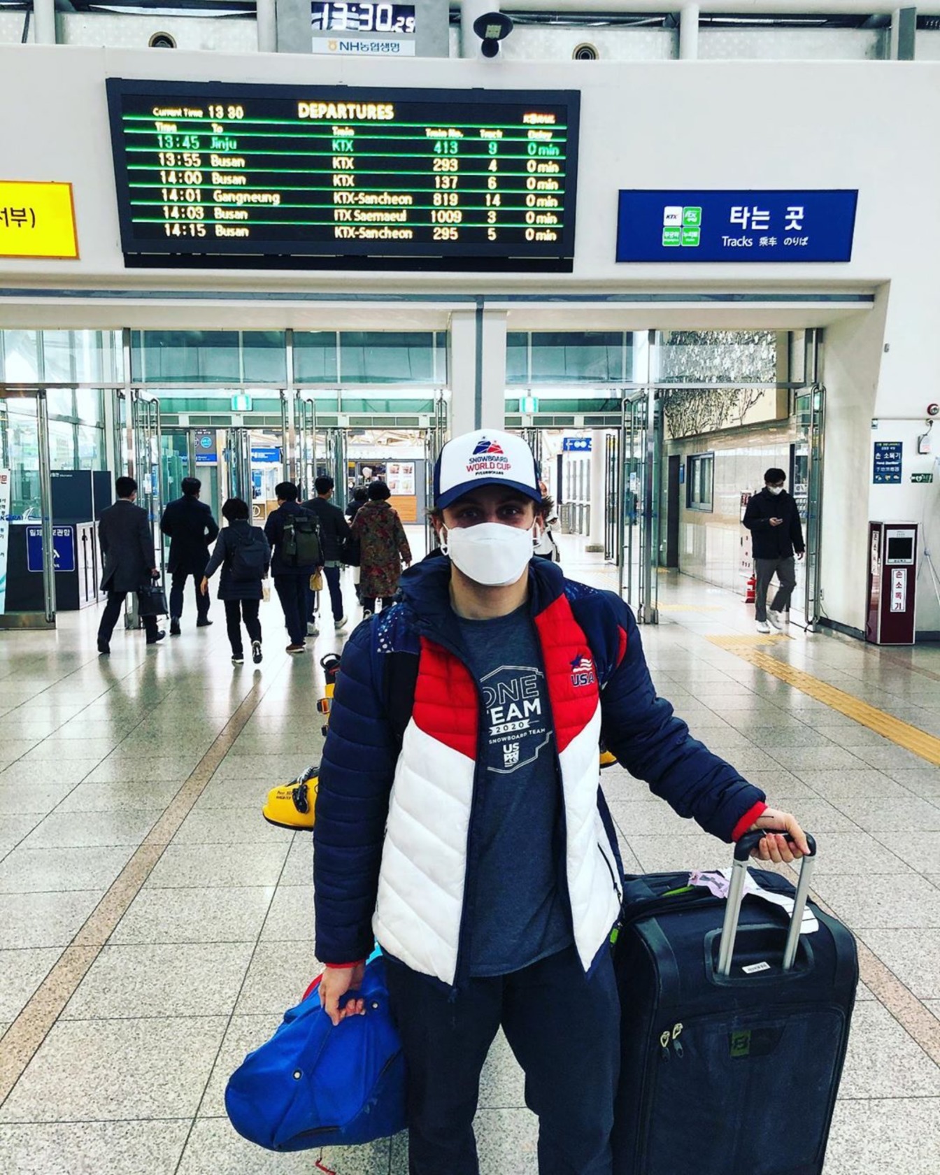 Myles Silverman in Seoul Station in early March 2020 wearing a face mask to protect him and his training and racing from COVID-19