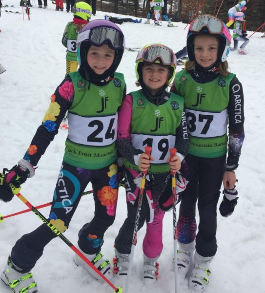 3 young ski racers having fun ski racing at Jack Frost in Pennsylvania.