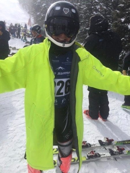 An Arctica Warm Up coat or race cape are the best protection for ski racers in the start line.