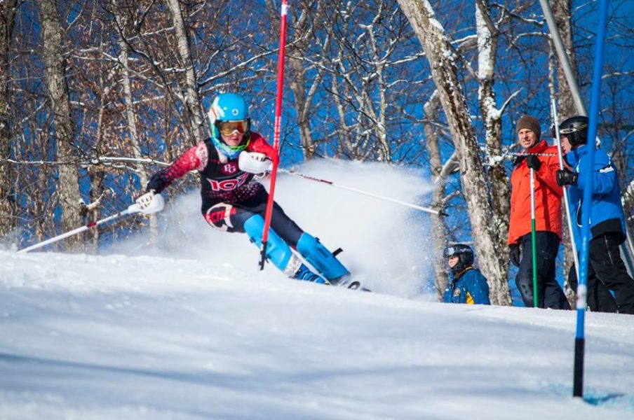 USSA U16 ski racer Shauna White on a slalom course in her ski racing apparel from Arctica - an Arctica GS Speed Suit.
