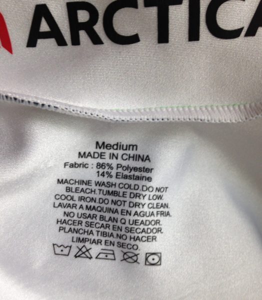 The fabric care label from inside and Arctica GS Speed Suit for alpine ski racing that shows how to wash your ski gear.